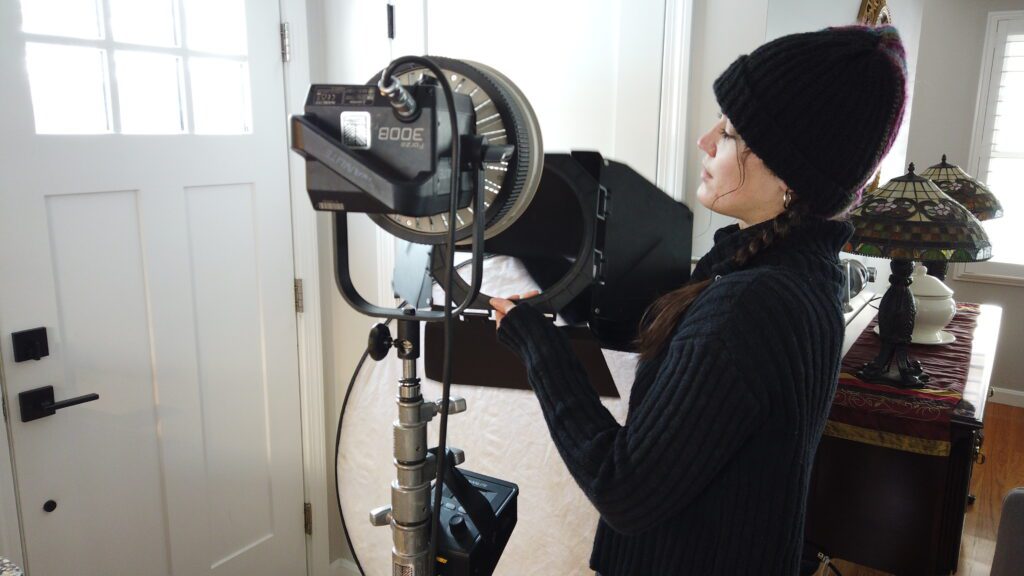 Photo of Eryn Gruttadauria on set filming her Re: Stock collection.