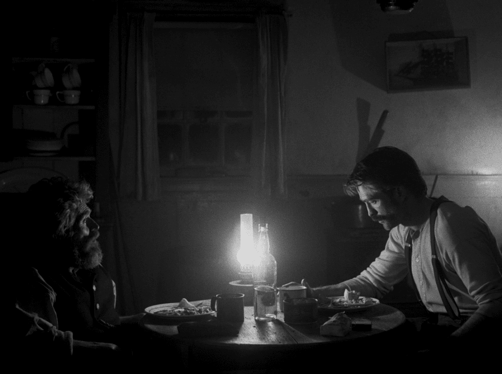 A still from The Lighthouse (2019), showing what analog film grain looks like in comparison with digital noise.