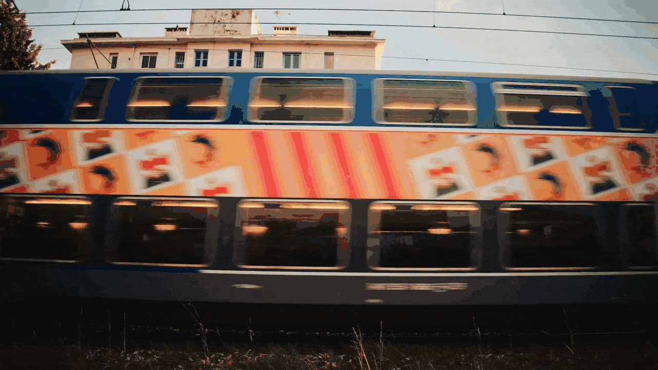 Animation showing a train passing through in the background with text messages overlaid on top.