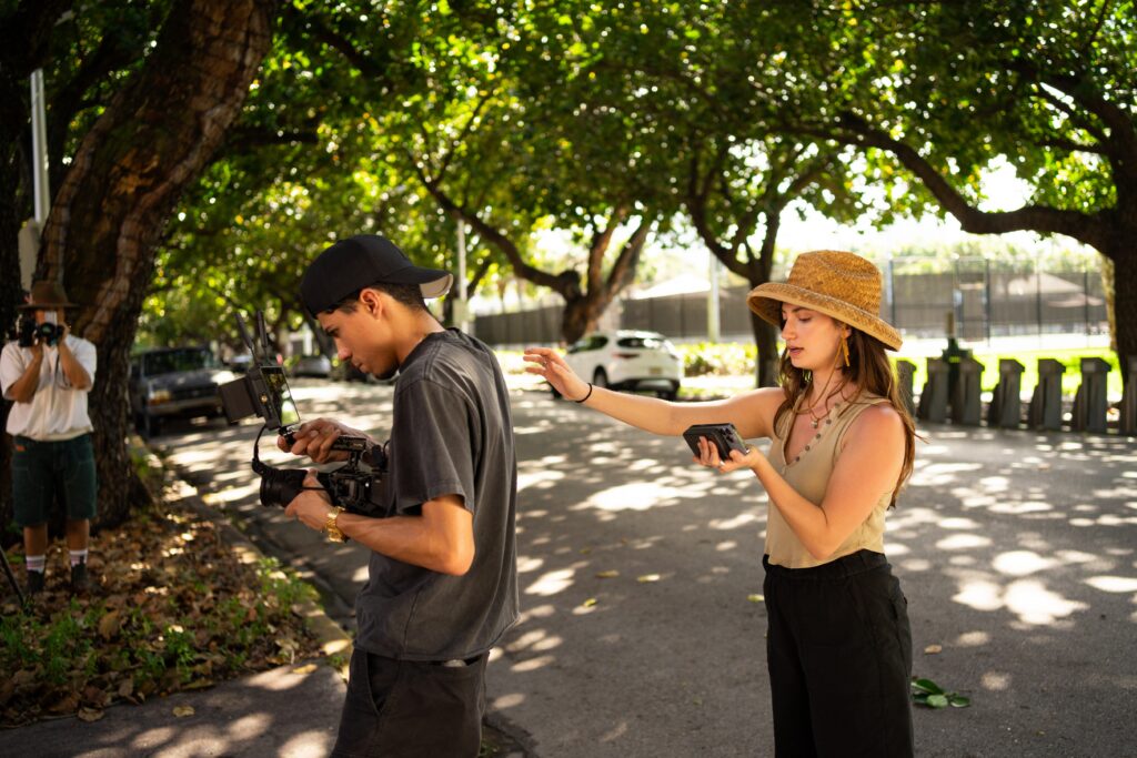 Photo of Dana DePirri, one of Storyblocks Re: Stock filmmakers, directing a scene for her footage collection.